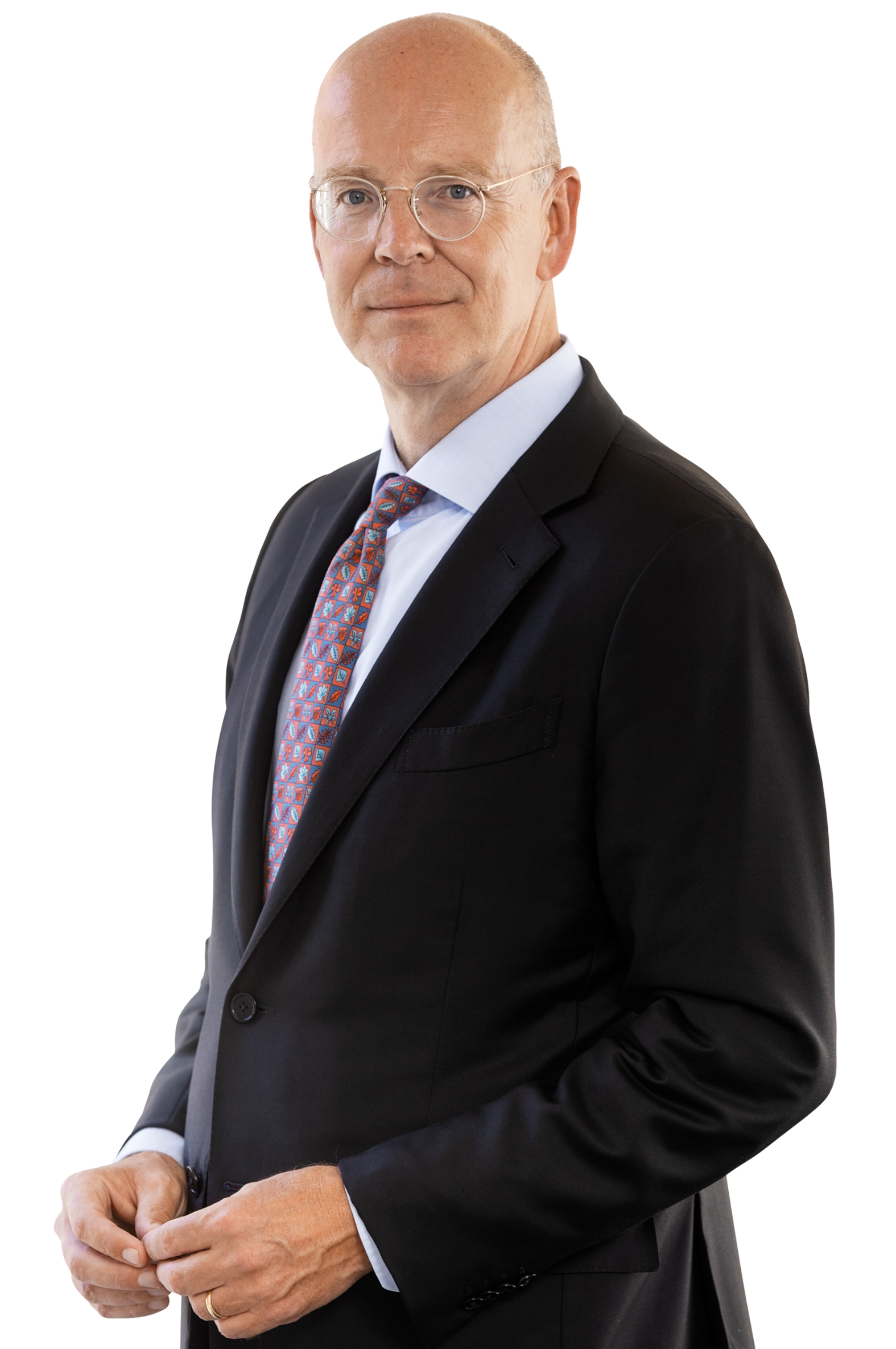 Martin Blessing, depicted slightly from the front, with glasses, in a dark suit.